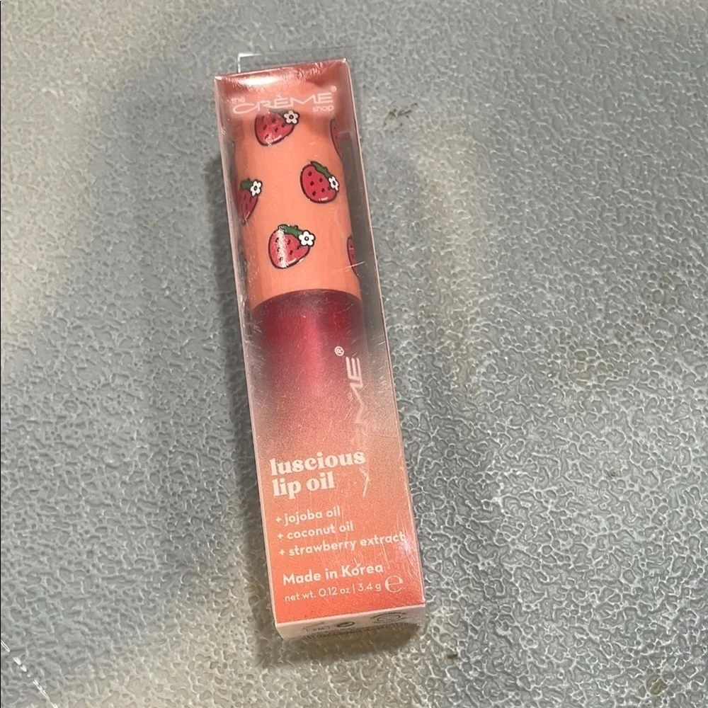 Creme Luscious Lip Oil with Strawberry Design
